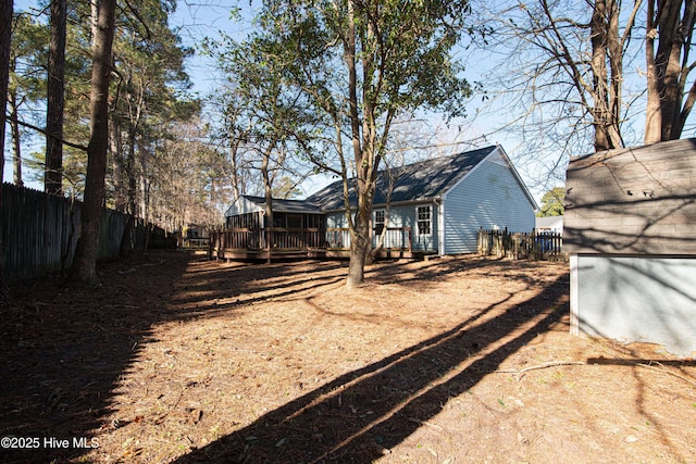 view of yard with a wooden deck