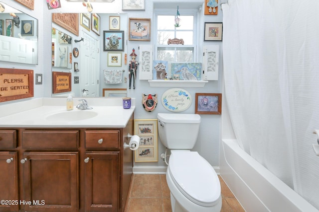 full bathroom featuring tile patterned floors, vanity, shower / tub combo, and toilet