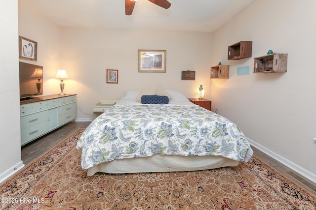 bedroom featuring ceiling fan and hardwood / wood-style flooring