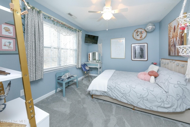 bedroom featuring ceiling fan and carpet flooring