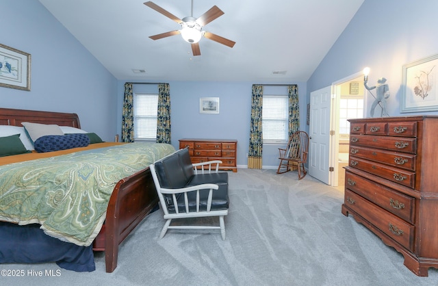 carpeted bedroom featuring ceiling fan and lofted ceiling