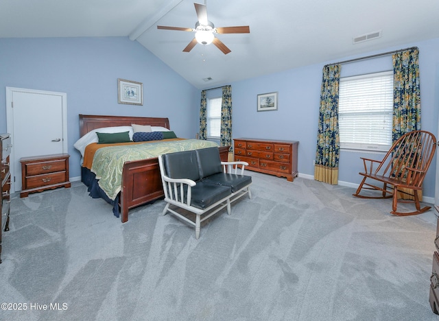 bedroom featuring ceiling fan, light carpet, and lofted ceiling with beams