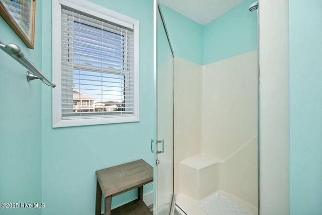 bathroom with an enclosed shower