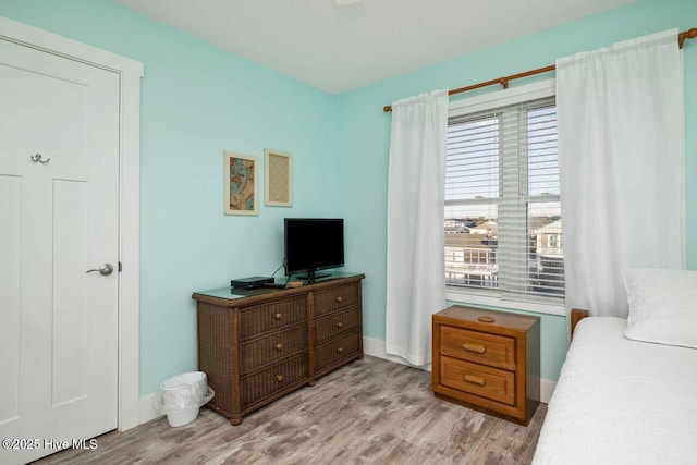 bedroom featuring light hardwood / wood-style floors