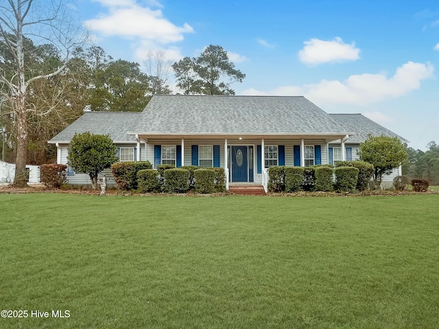 view of front facade featuring a front lawn and a porch