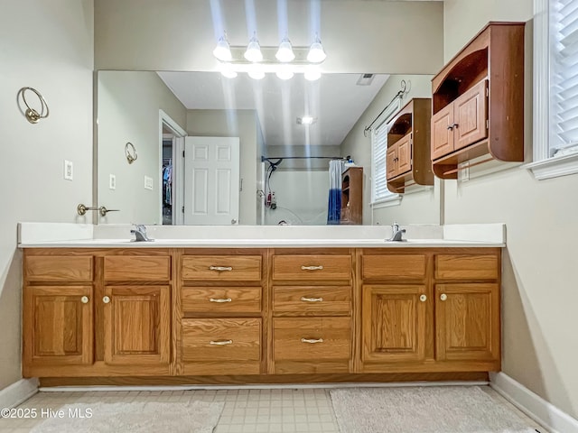 bathroom featuring vanity and a shower with curtain