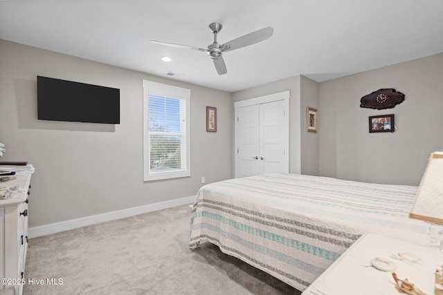carpeted bedroom with recessed lighting, visible vents, a ceiling fan, a closet, and baseboards