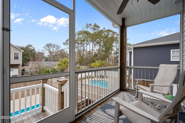 balcony featuring ceiling fan