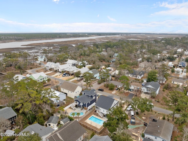 birds eye view of property with a residential view