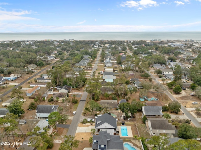 birds eye view of property featuring a residential view and a water view