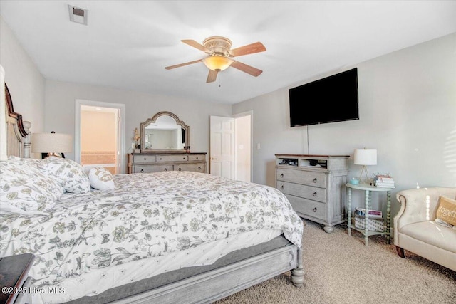 carpeted bedroom featuring ceiling fan