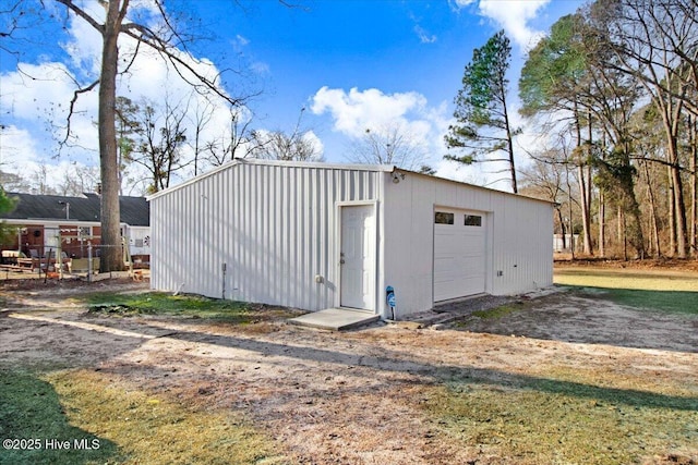 view of outdoor structure with a garage