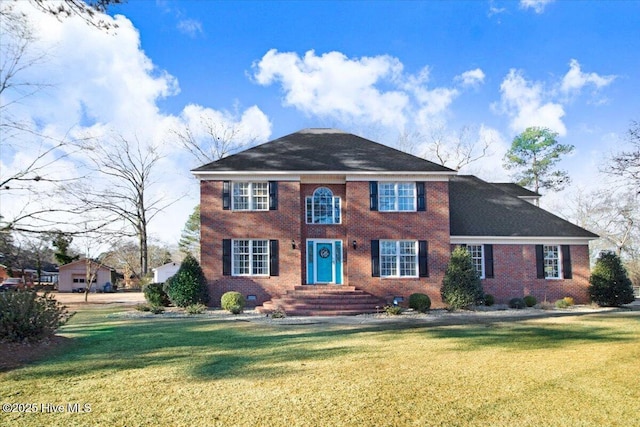 view of front of house with a front lawn