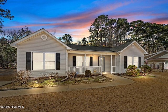 ranch-style house with a porch