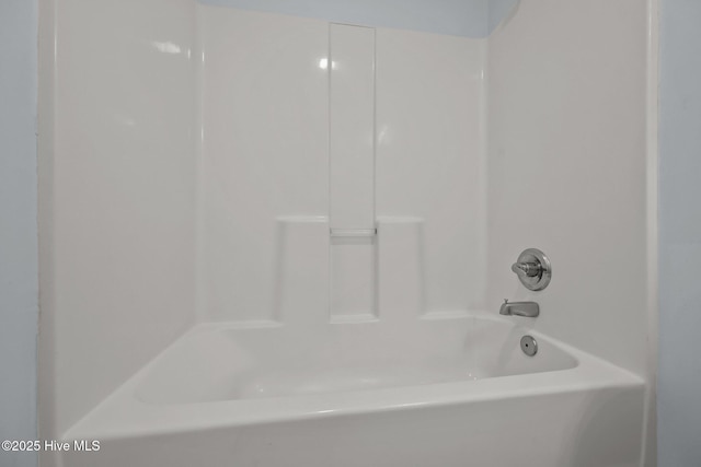 bathroom with shower / bathing tub combination