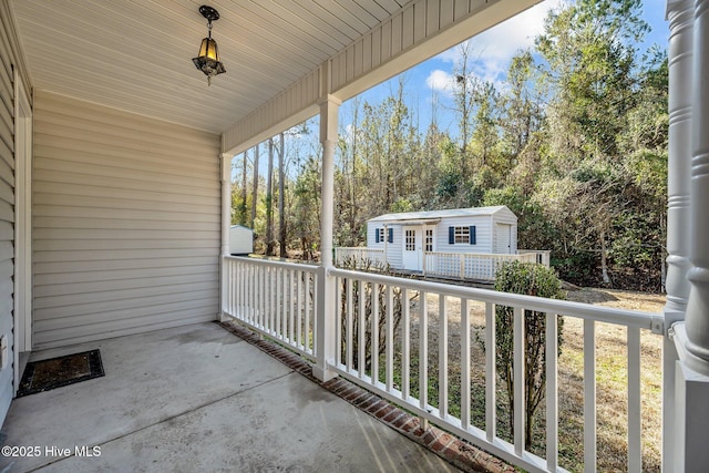 balcony featuring covered porch