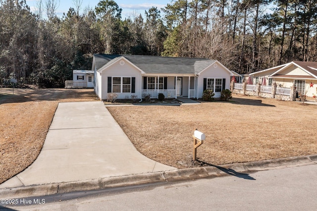 ranch-style house featuring a porch