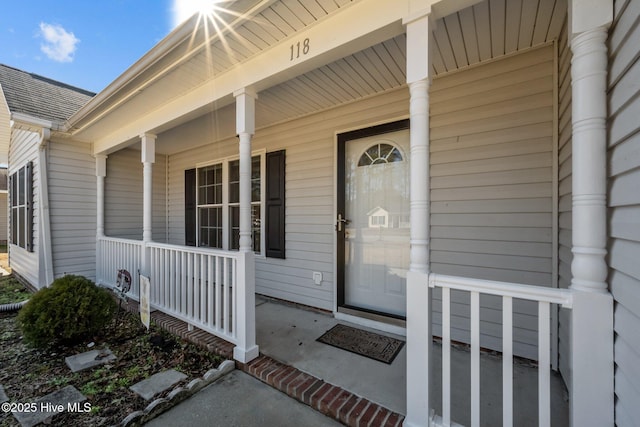 property entrance with a porch