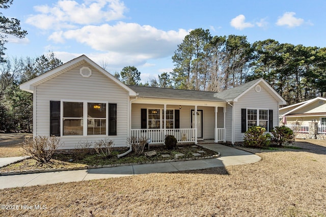 ranch-style home featuring a porch