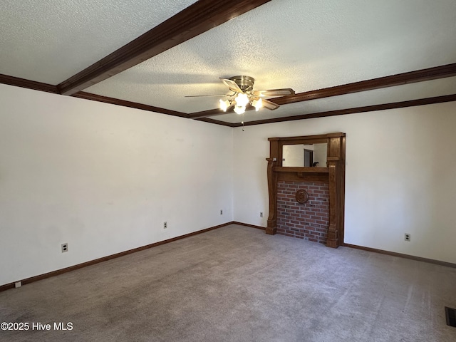 unfurnished living room with ceiling fan, carpet, beamed ceiling, and a textured ceiling