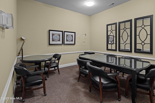 dining room featuring carpet