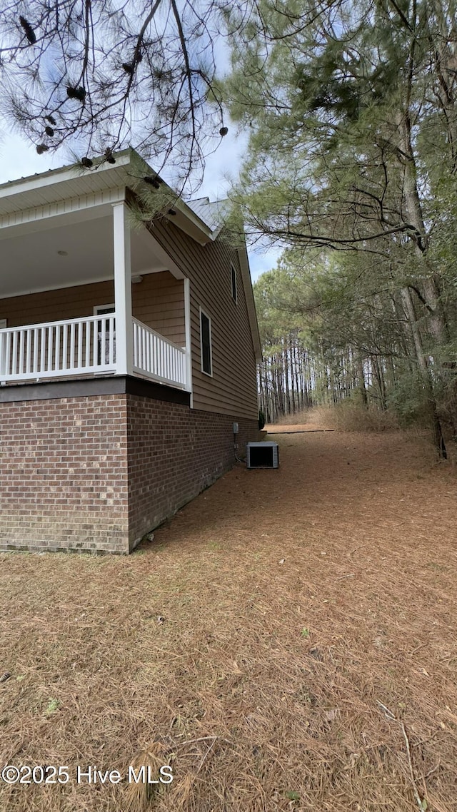 view of property exterior featuring central AC