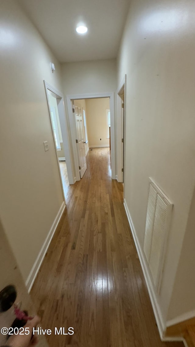 hall featuring light hardwood / wood-style floors