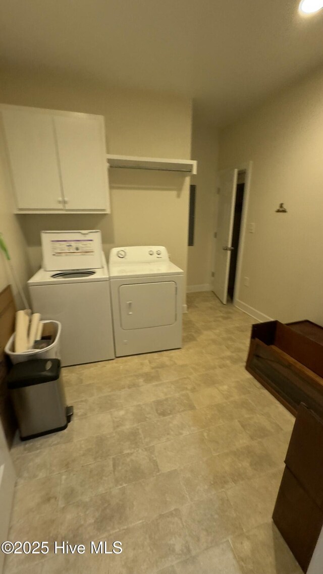 kitchen with light wood-type flooring, appliances with stainless steel finishes, light brown cabinets, and light stone countertops