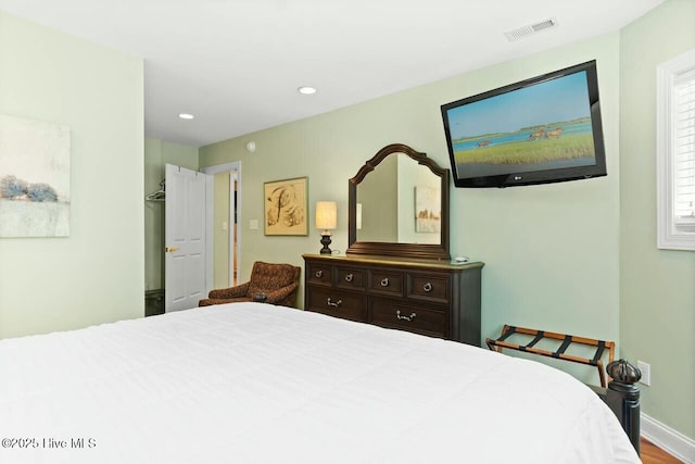 bedroom featuring hardwood / wood-style floors