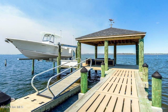 dock area with a water view