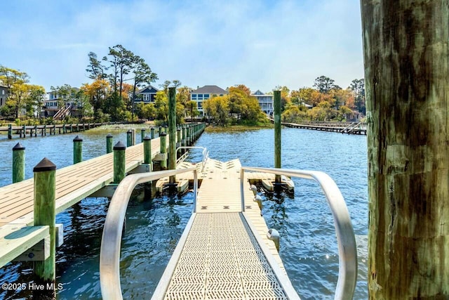 view of dock with a water view