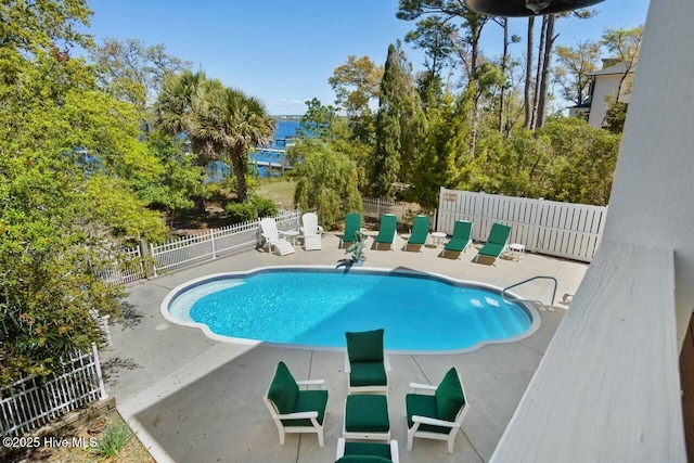 view of swimming pool featuring a patio