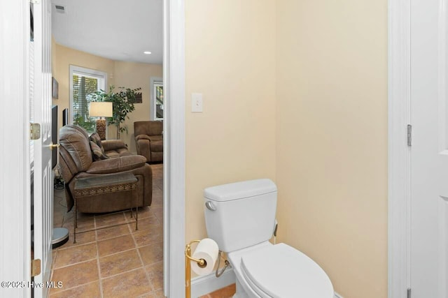 bathroom featuring toilet