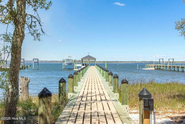 dock area featuring a water view