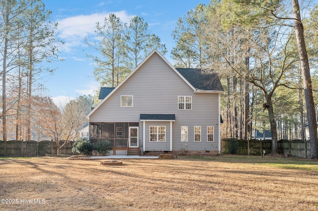 view of front facade featuring a sunroom and a front lawn