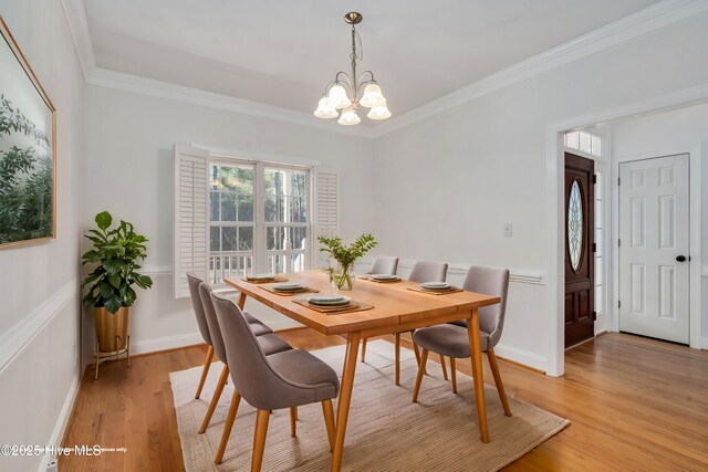 kitchen featuring crown molding, light tile patterned flooring, range with two ovens, and backsplash