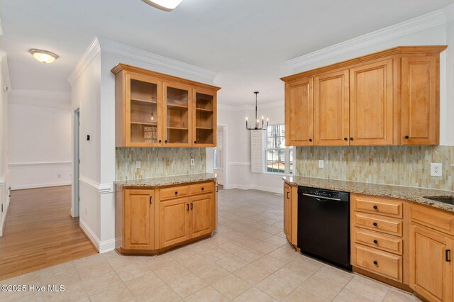 kitchen with pendant lighting, sink, decorative backsplash, light stone counters, and stainless steel appliances