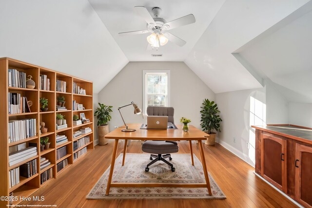 bedroom featuring hardwood / wood-style flooring and ceiling fan