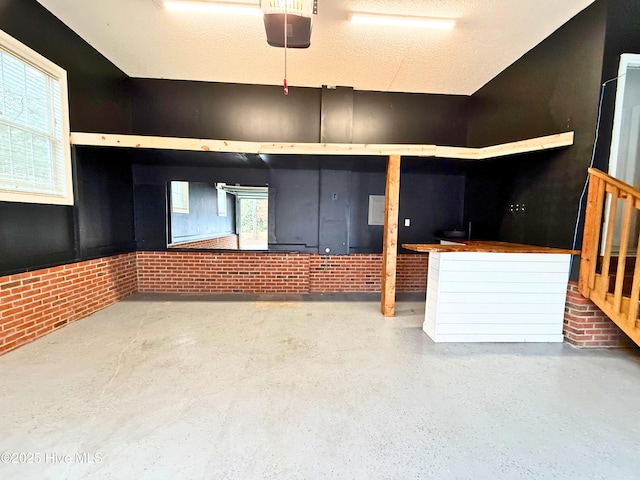 office featuring ceiling fan, lofted ceiling, and light hardwood / wood-style floors