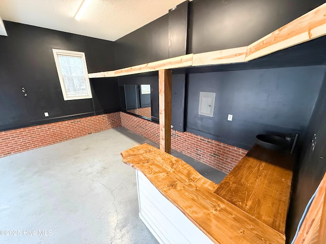 bonus room featuring ceiling fan, wood-type flooring, and vaulted ceiling