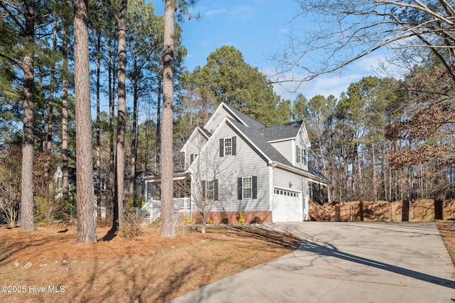 view of property exterior with a garage