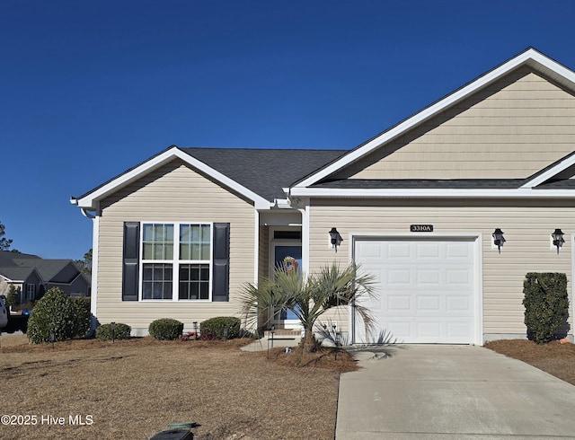 view of front of property with a garage