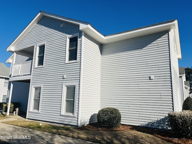 view of home's exterior featuring a balcony