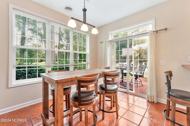 view of tiled dining area