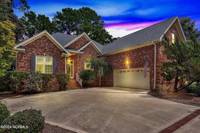 view of front of property featuring a garage