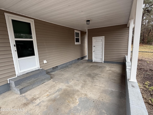 view of patio featuring a carport