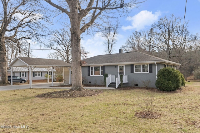 single story home with a front lawn and a carport