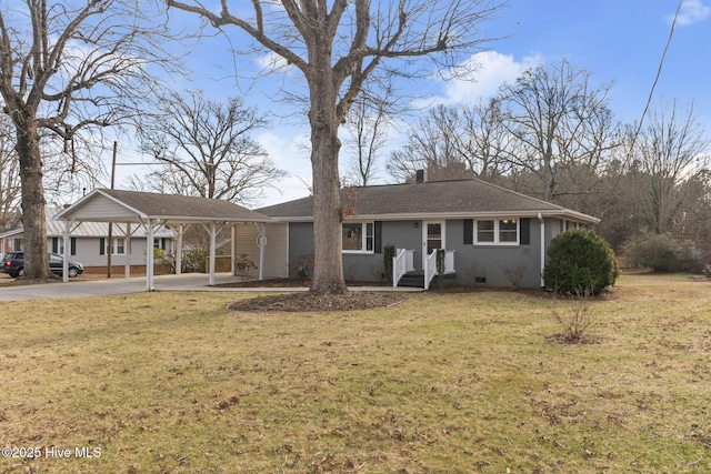 ranch-style house with a carport and a front lawn