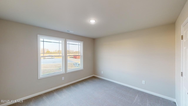 view of carpeted spare room