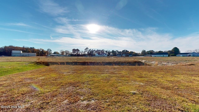 view of yard featuring a rural view